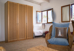 A cot in upstairs bedroom