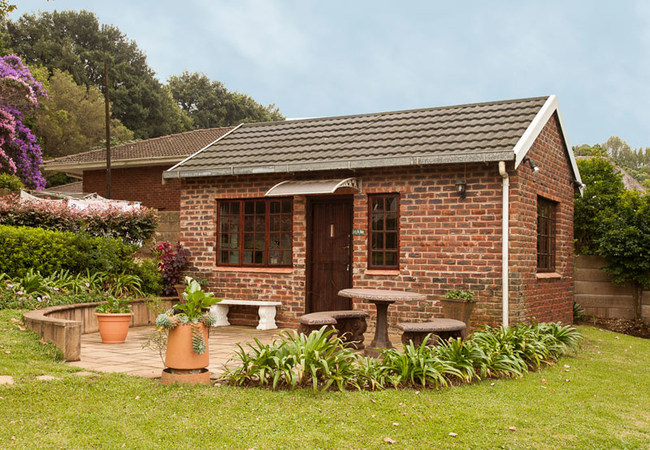 Exterior of The Studio small garden cottage