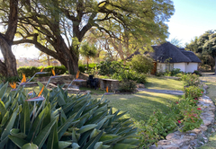 Windsong garden with veiw of Rose Cottage